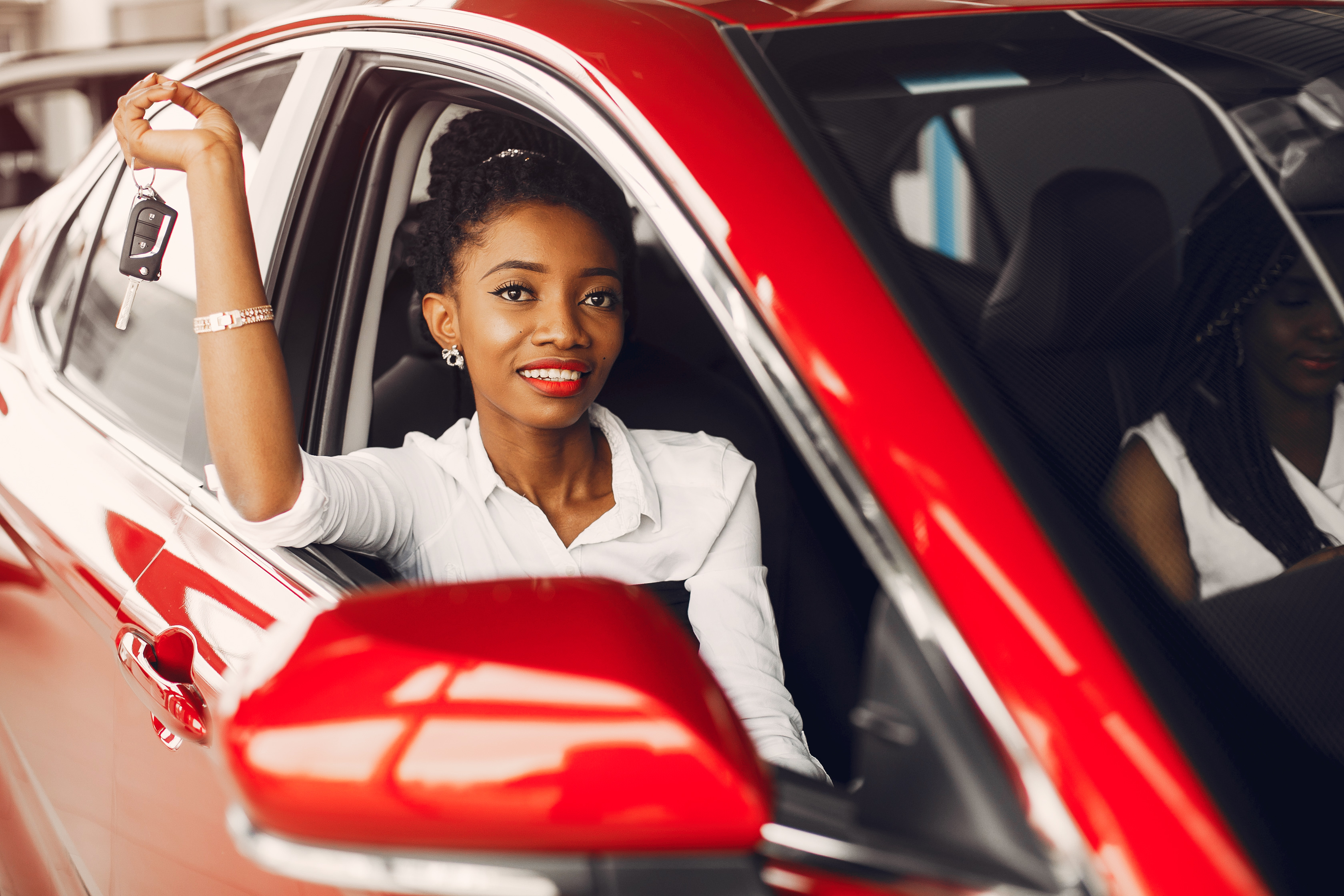 A Twende driver holding up their car keys